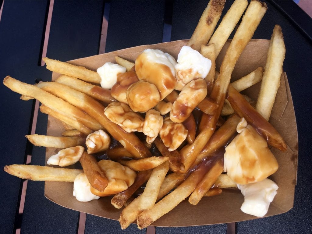 Overhead shot of weed poutine poutine has lots of gravy and cheese curds on it, one of the best cannabis butter weed edible recipes