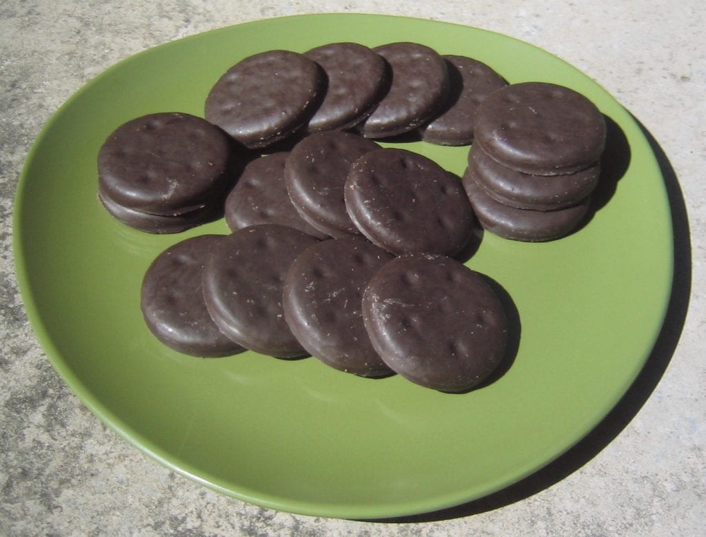 weed thin mint cookies on a green plate. Chocolate covered weed thin mint cookies. 